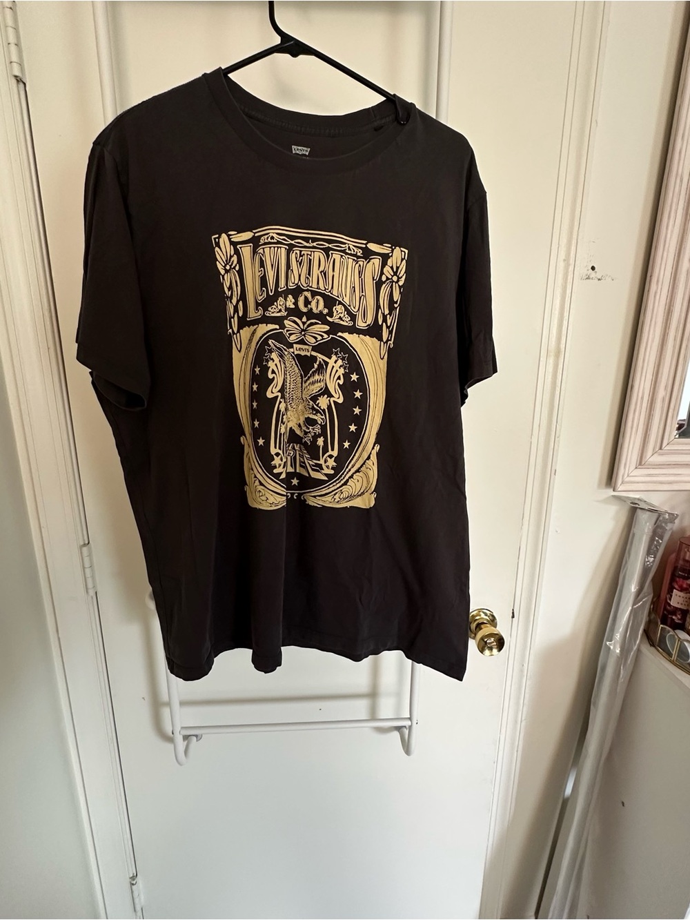 Levi's Black Short Sleeve Tee with Gold Graphic Crest